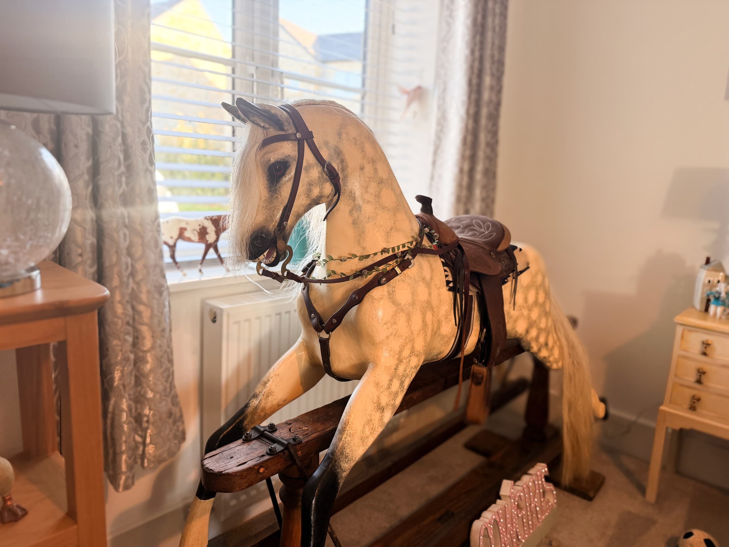 janes handmade rocking horse in the living room of the lark