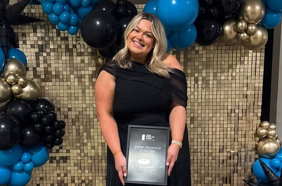 holly posing with her award