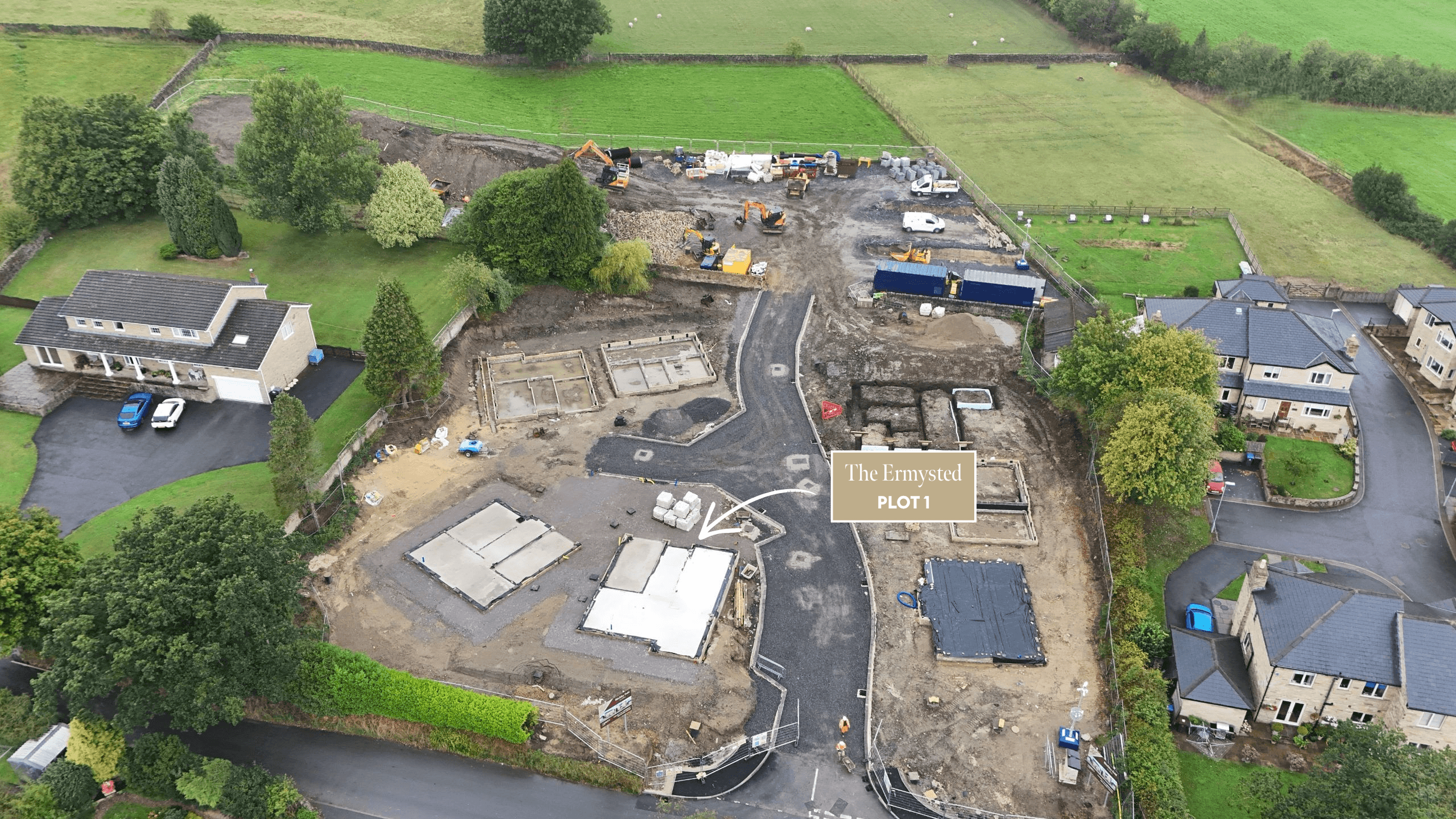 Aerial view of Birchley Fold under construction, with Plot 1, The Ermysted, highlighted beside the development road.